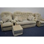 A CELEBRITY FOUR PIECE LOUNGE SUITE, comprising a three seater settee, pair of electric rise and