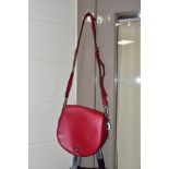 THREE LADIES HANDBAGS, comprising a red leather Karl Lagerfeld bag with shoulder strap, width 26cm x