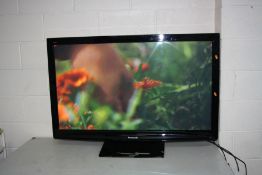 A PANASONIC TX-P50C10B 50 inch TV (crack to stand), an Alba DVD player with remote, a Humax