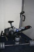A QUANTITY OF EXERCISE EQUIPMENT including an Olympus Sport exercise bike (distressed) , a York