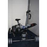 A QUANTITY OF EXERCISE EQUIPMENT including an Olympus Sport exercise bike (distressed) , a York
