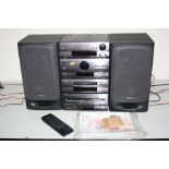 A TECHNICS SH-CH750 MIDI HI FI with tuner, amp, dual tape ,CD players and matching speakers (PAT