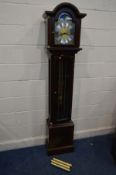 A FRANZ HERMLE MAHOGANY LONGCASE CLOCK, the arched brass and silvered dial with a automaton movement