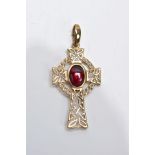 A 9CT GOLD CELTIC CROSS PENDANT, of an openwork design set with a central red paste cabochon
