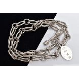 A WHITE METAL CHAIN WITH A SILVER FOB, the chain fitted with fancy openwork links fitted with a T-