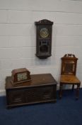 AN EDWARDIAN WALNUT HALL CHAIR, together with an oak wall clock, oak blanket chest (sd) and an Art