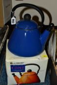A LE CREUSET 'KONE' STOVE TOP KETTLE IN BOX, in unused condition, in blue