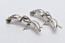 A PAIR OF EARLY 20TH CENTURY CHINESE SILVER PEPPERETTES, in the form of bean or seed pods, each with