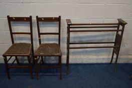 AN EDWARDIAN MAHOGANY AND STRUNG TOWEL RAIL, along with a Edwardian mahogany rocking chair and a