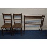 AN EDWARDIAN MAHOGANY AND STRUNG TOWEL RAIL, along with a Edwardian mahogany rocking chair and a