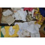 THREE BOXES OF TABLE LINEN, THROWS, etc, including embroidered items, broiderie anglaise apron,