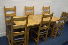 A MODERN SOLID GOLDEN OAK EXTENDING DINING TABLE, open width 167cm x closed width 122cm x depth 80cm