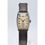 A GENTS WRISTWATCH, curved rectangular cream dial, Arabic numerals, with a seconds subsidiary dial