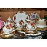 ROYAL ALBERT 'OLD COUNTRY ROSES', comprising teapot, height 16cm, cake/sandwich plate, milk jug,