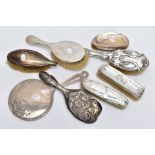 A SELECTION OF SILVER VANITY PIECES, to include two rectangular clothes brushes with hallmarks for