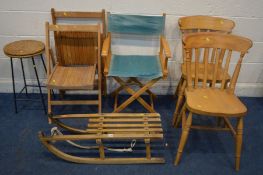 A VINTAGE BEECH SLEIGH, along with a folding director's chair, two beech folding chairs, two kitchen