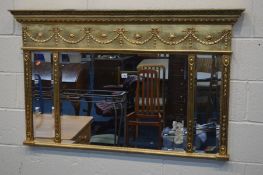 A FRENCH GILT WOOD TRIPPLE BEVELLED EDGE WALL MIRROR, width 132cm x height 81cm