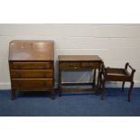 AN OAK BUREAU, with three drawers, width 74cm x 42cm x height 100cm, and an oak side table with