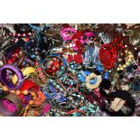 A LARGE BOX OF COSTUME JEWELLERY, to include bangles, bracelets, beaded necklaces, rings,