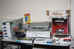 A QUANTITY OF HOUSEHOLD ELECTRICALS all boxed and new including sizzle pans, a George Foreman Grill,
