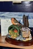 A BOXED LIMITED EDITION BORDER FINE ARTS SCULPTURE 'In The Potting Shed' (Robin nesting in old paint