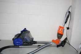 A VAX POWER COMPACT VACUUM CLEANER and an unbranded small stick vacuum (both PAT pass and