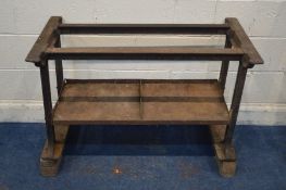 A VINTAGE CAST IRON TABLE BASE united by a undershelf, width 105cm x depth 56cm x height 73cm