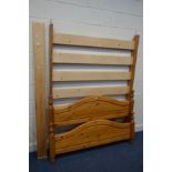 A MODERN PINE 4FT6 BED FRAME with side rails and slats