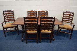 THEODORE ALEXANDER, A LARGE HARDWOOD PLANK TOP REFECTORY TABLE, on an ornate base united by metal