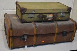 A VINTAGE TRAVELING SUITCASE, with an internal tray, width 92cm x depth 56cm x height 32cm and a