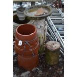 A TERRACOTTA CHIMNEY POT 65cm high, a Composite birdbath with three ladies forming the base and a
