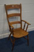 A PERIOD STAINED BEECH LADDERBACK ARMCHAIR