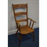 A PERIOD STAINED BEECH LADDERBACK ARMCHAIR