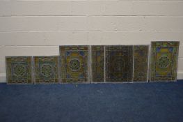 SEVEN MATCHING LEAD STAINED GLASS WINDOWS one at 69cm x 49cm, four at 63cm x 48cm, two at 43cm x