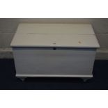 A PAINTED PINE BLANKET CHEST on turned legs, width 87cm x depth 50cm x height 53cm (sd) and a cheval