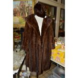 A LADIES RACKHAMS OF BIRMINGHAM BROWN MUSQUASH FUR COAT, approximate UK size 16/18, short arm