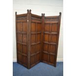 A REPRODUCTION OAK PANELLED THREE FOLD FLOOR STANDING SCREEN, each panel width 69cm x overall