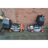 TWO FLYMO PETROL LAWN MOWERS with Briggs and Stratton engine and grass box ( engine pulls freely but