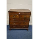AN EARLY 20TH CENTURY OAK CHEST OF TWO OVER FOUR LONG DRAWERS, long secret frieze drawer, brass swan