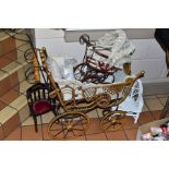 A MODERN REPRODUCTION DOLLS PRAM, with integral lace parasol, complete and in fairly good condition,