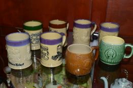 A COLLECTION OF EIGHT BOURNE DENBY COMMEMORATIVE MUGS, a mixture of printed and relief decorated