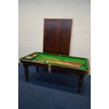 A BURROUGHS AND WATTS, THE COTTAGE BILLIARDS TABLE, the mahogany frame on turned and fluted legs,