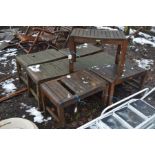 SEVEN HARDWOOD GARDEN STOOLS, all labelled 'Peninsula collection' 65cm wide 40cm deep and 44cm