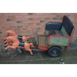 AN ORNAMENTAL DUAL HORSE AND CART with cast metal prancing horses 70cm long and buggy 87cm wide