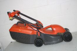 A FLYMO FLEXIMO ELECTRIC LAWN MOWER with grass box (PAT pass and working)