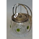 A GEORGE V SILVER MOUNTED CUT GLASS BISCUIT BARREL, with swing handle, pull off cover with ball