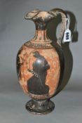 A GREEK TERRACOTTA 'ATTIC' EWER, possibly 5th Century, the top rim with pinched design, simple strap