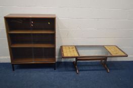 AN AFROMOSIA SLIDING GLAZED BOOKCASE, on a metal base, width 92cm along with a teak glass and tile