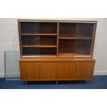 A HILLE INTERPLAN STYLE TEAK FOUR DOOR SIDEBOARD, with a matching glazed bookcase, width 187cm x