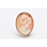 A 9CT GOLD CAMEO BROOCH, of an oval design, the cameo depicting a lady in profile within a collet